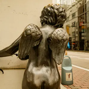 Cupid aiming secretly
