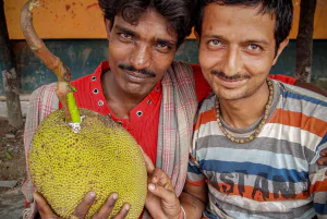 Men holding jackfruit