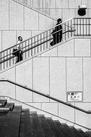 Figures climbing stairs
