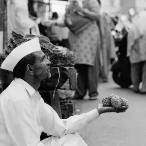 Man selling artichokes