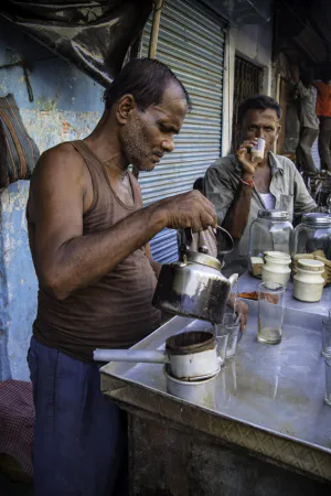 Man pouring Chai
