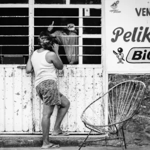 Woman standing talking in the storefront