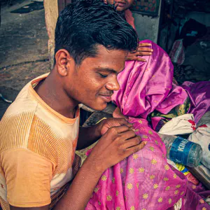 Man doing embrodery