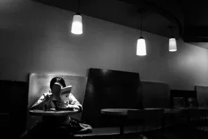 Woman studying in cafe