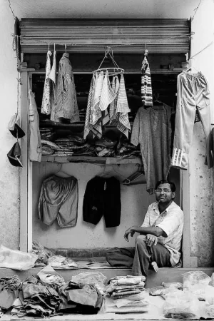 Man selling old clothes