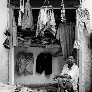 Man selling old clothes