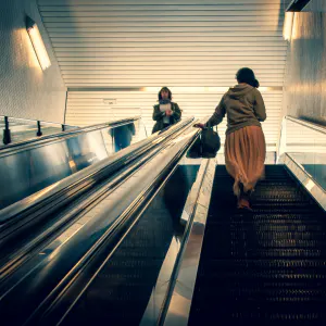 Woman on an escalator