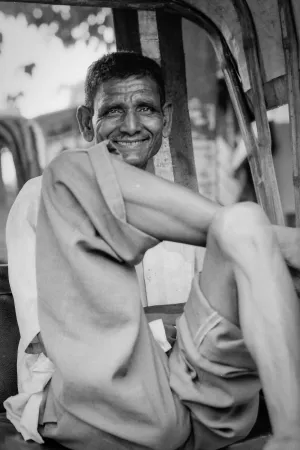 Gentle smile of rickshaw wallah