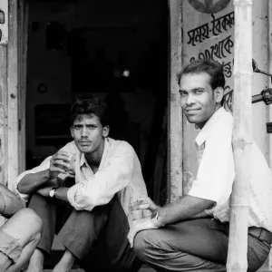 Men drinking a cup of chai