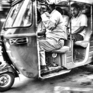 Speeding auto rickshaw