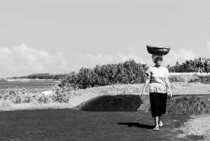 Woman carrying basket on head
