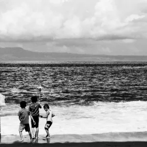 Kids playing on edge of water