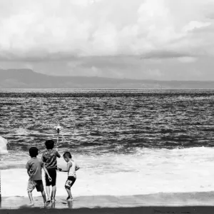 Kids playing on edge of water