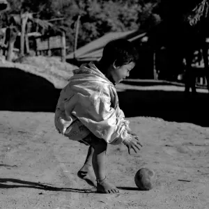 Boy playing with ball