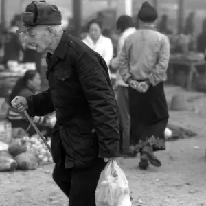 Old man at the market in Muang Sing