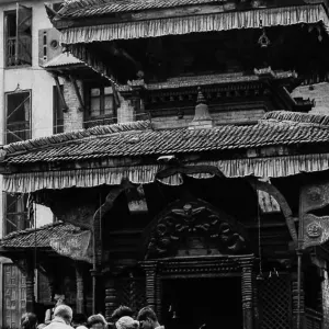 People in front of a Hindu temple