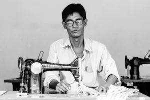 Seamster with glasses