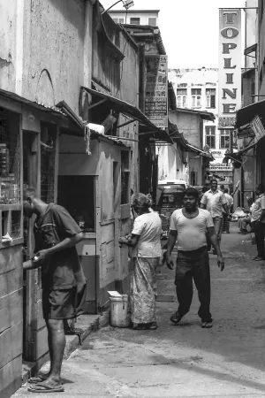 People in narrow street