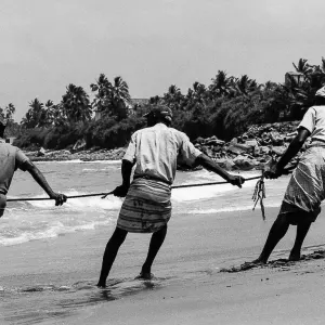Fishermen pulling rope