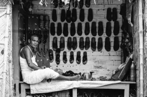 Man selling sandals