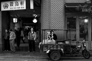 Man standing in a corner of street