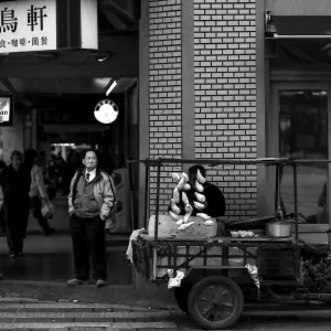 Man standing in a corner of street