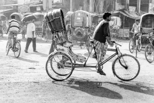 Cycle rickshaw running street