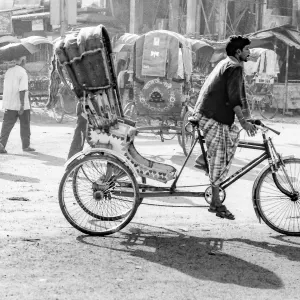 Cycle rickshaw running street