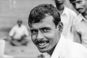 Man looking at camera curiously
