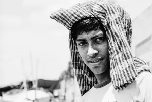 Young man with cloth on head