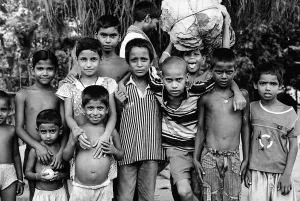 Children gathering in front of camera