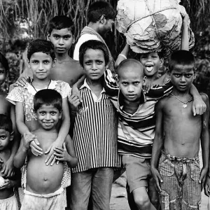 Children gathering in front of camera