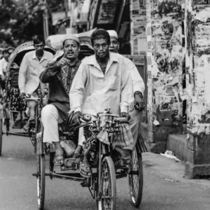 Man pointing on cycle rickshaw