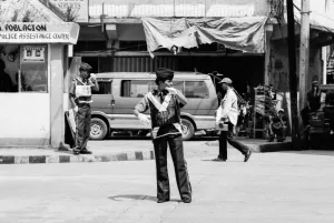 Woman directing vehicular traffic
