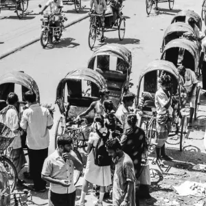 People getting on cycle rickshaw