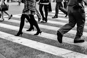 Legs crossing street