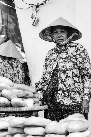 Woman selling baguette
