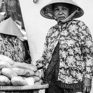 Woman selling baguette