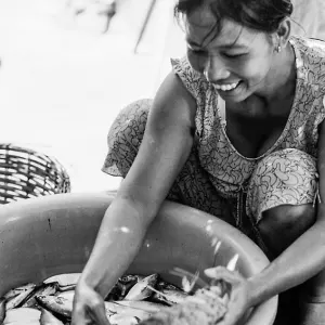 Woman selecting fish