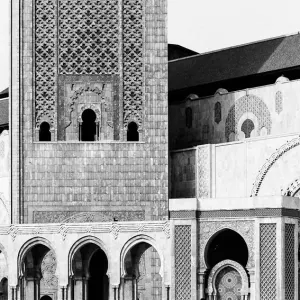 Figure walking square in front of Grande Mosquée Hassan II