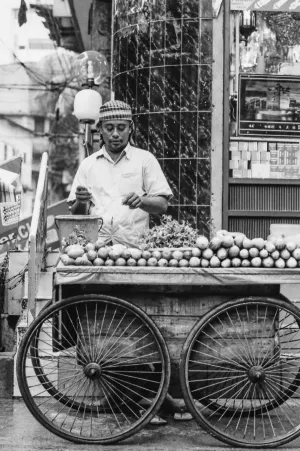 Street vendor selling mangoes