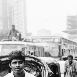 Smiling passenger on cycle rickshaw