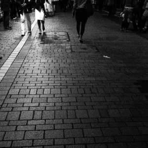 Pedestrians walking at night