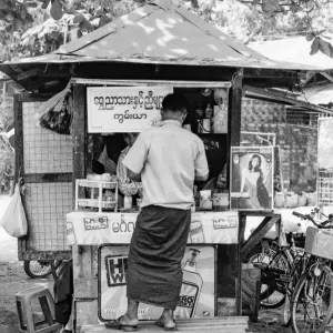 Man shopping at a kiosk