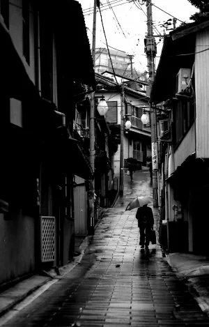 Umbrella in wet lane