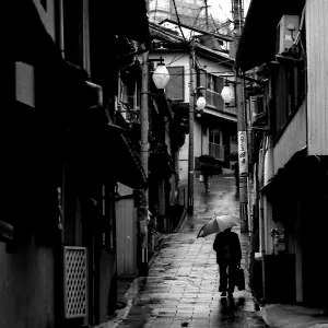 Umbrella in wet lane