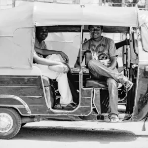 Men chatting on auto rickshaw