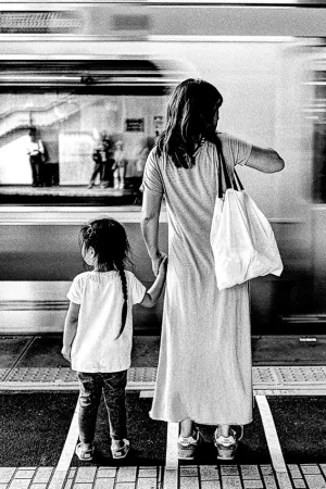 mother and girl on the platform