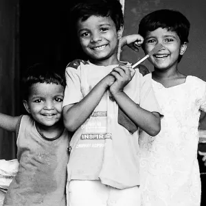 Three kids smiling