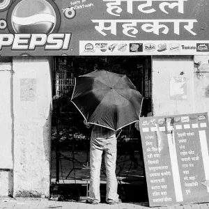 Umbrella in front of shop